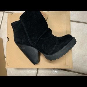 Adorable black suede bootie with chunky heels. Bland new in box, never worn